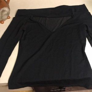 Black off the shoulder long sleeve with V neck.